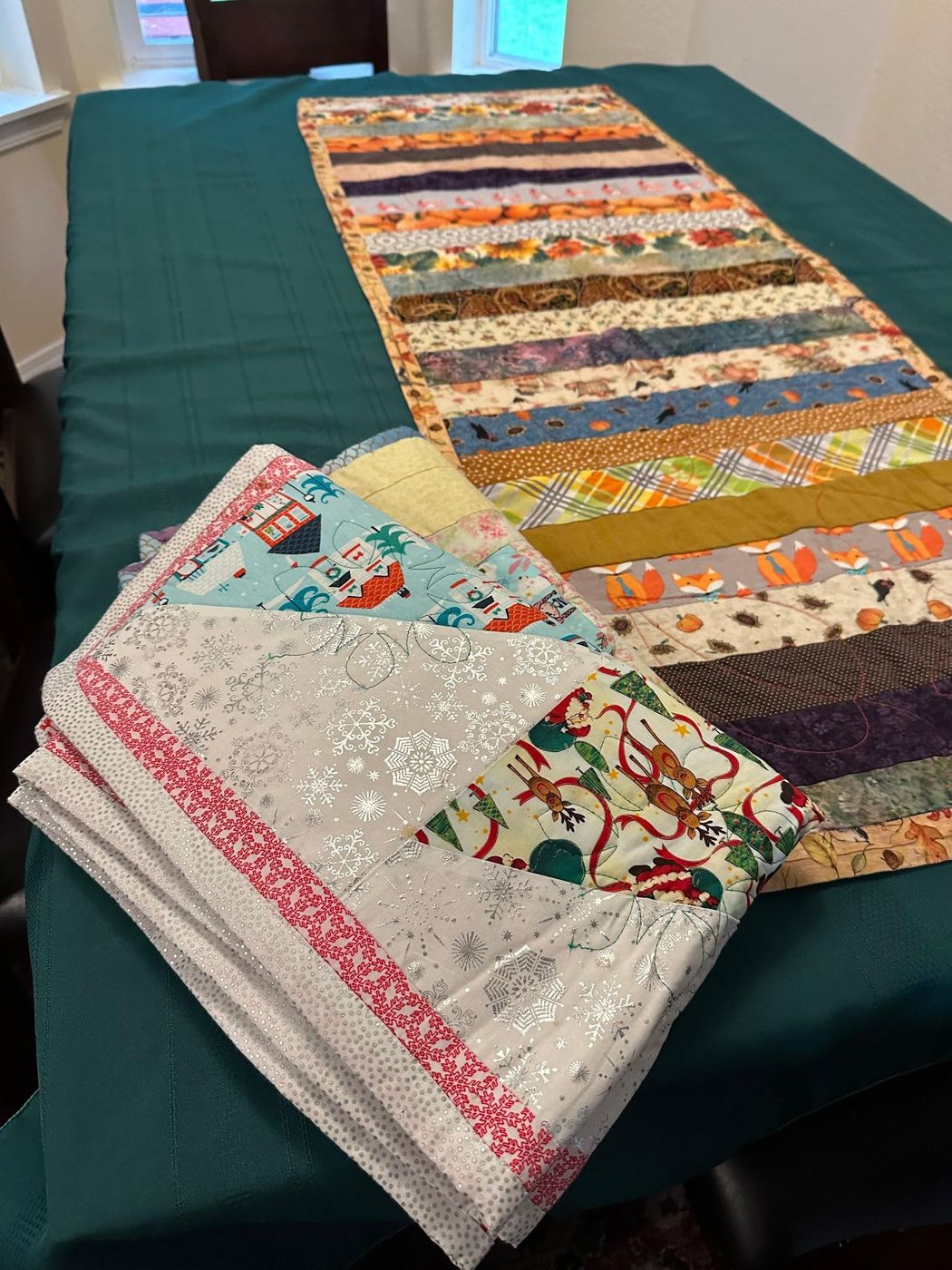 Two handmade quilted table runners